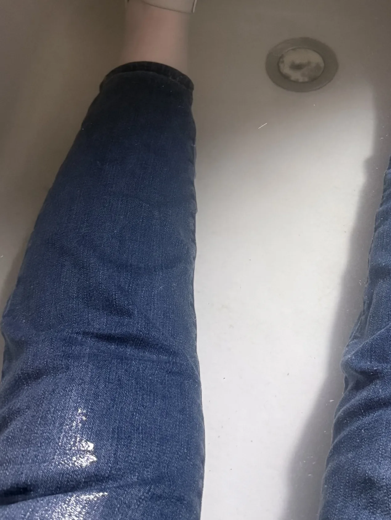Shoes, Jeans, and a tub of hot water