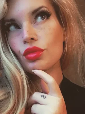 Worship the strap on of a Dominant Blonde English Mistress on cam
