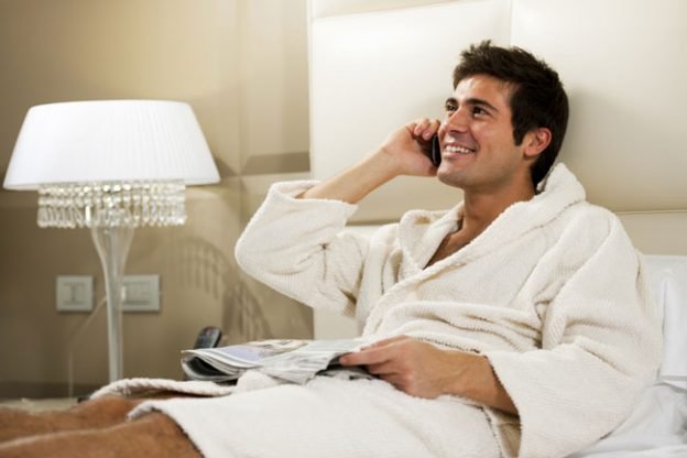 man enjoying phone sex