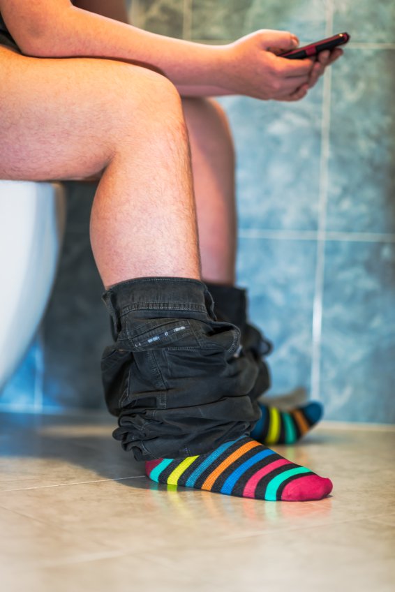 In Bathroom with Smartphone
