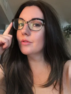 Confident, teasing, and very comfortable being in charge
